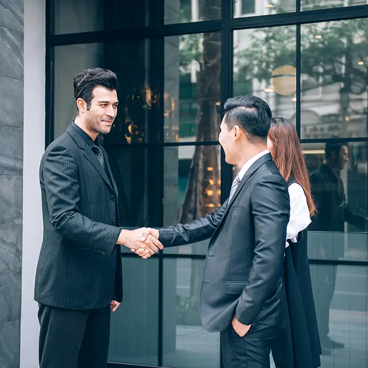 business-people-shaking-hand-with-partner-hotel